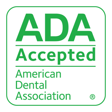 ADA Seal of Acceptance with green text stating ADA accepted, American Dental Association, with registered trademark symbol