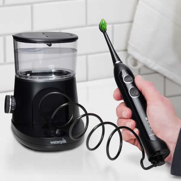 World S First Flossing Toothbrush Waterpik Oral Health