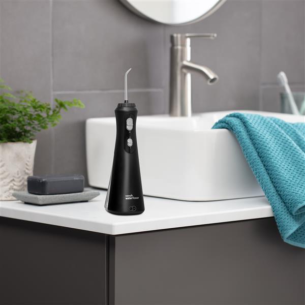 Black Cordless Plus Water Flosser WP-462 In Bathroom