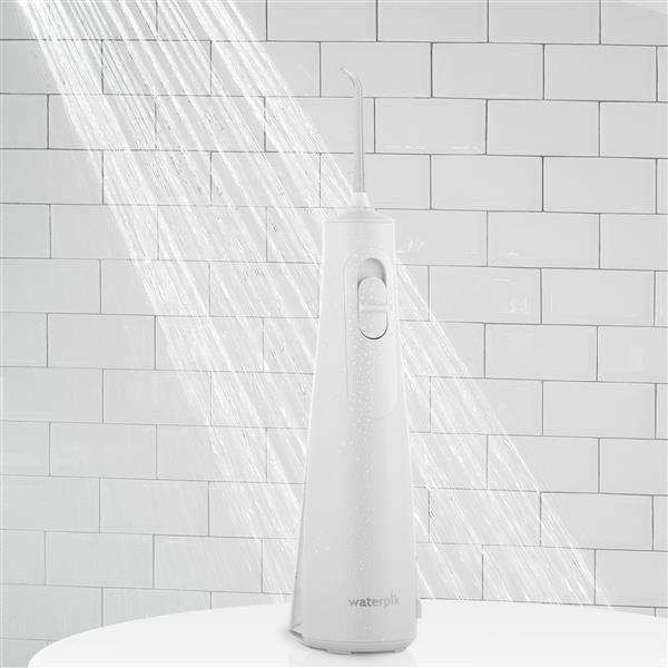 White Cordless Enhance Water Flosser WF-21W010 in Shower